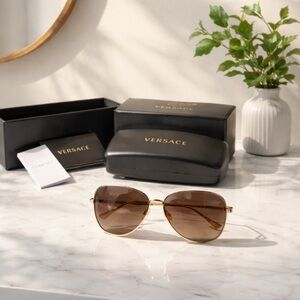 Versace Women's Sunglasses with Gold Frame